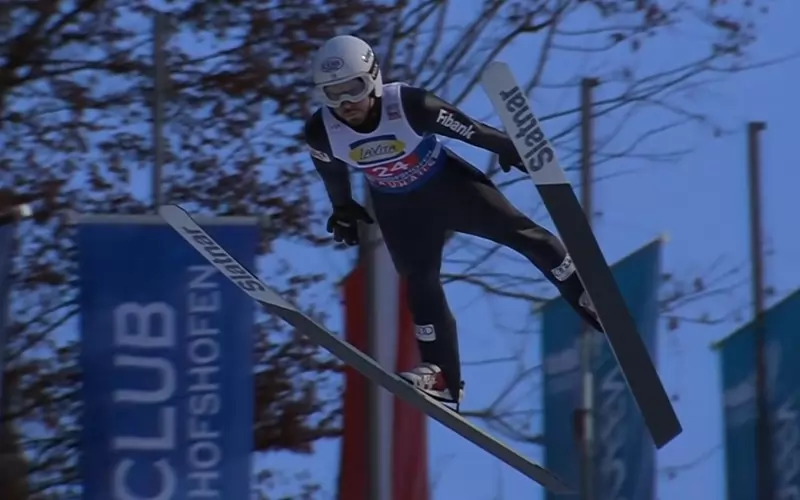 Зографски лети по време на първия си скок в Бишофсхофен, в който постигна 129 метра