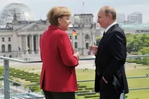Путин и Меркел са съгласни Донбас да получи специален статут