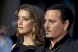 Джони Деп и Амбър Хърд сякаш са решили да се борят