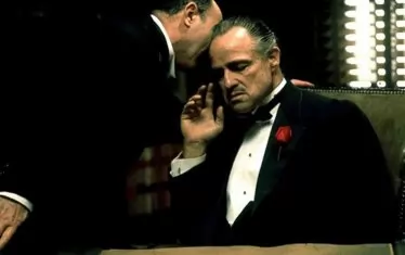 Марлон Брандо в "Кръстникът",  филм на Франсис Форд Копола.  