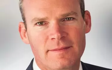  Саймън Ковъни