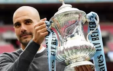 Хосеп Гуардиола стана първият треньор в историята на английския футбол, извел отбора си до трите основни отличия в рамките на един сезон.