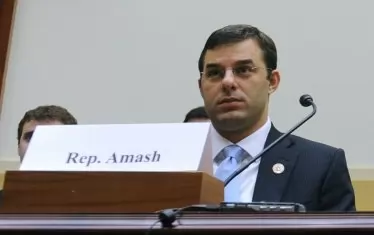 Джъстин Амаш