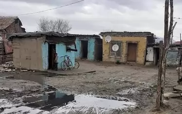  Ромско селище. Тази снимка придружава доклада на страницата на комисаря по човешките права.
