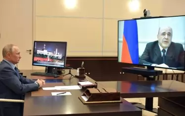  Моментът, в който Мишустин съобщава новината на Путин