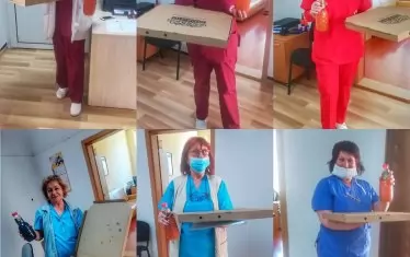 Ежедневие, запечатано в кадри - персоналът на болницата в Исперих получава като подарък храна и напитки.