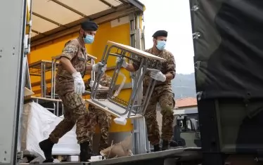  И отново военните камиони носят чинове за новата учебна година.