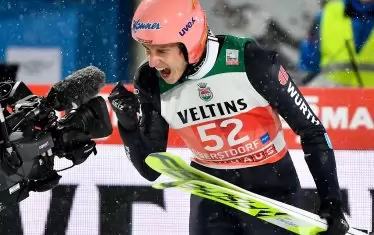 Германецът Карл Гайгер ликува след победата си.