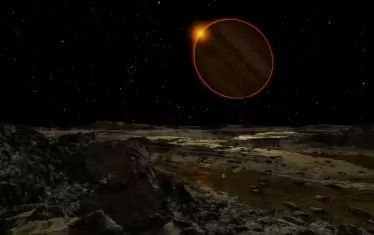 Юпитер (на 779 млн. км от звездата), гледан от спътника Европа.