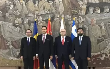 Началото на шумотевицата около двете евентуални кандидатури всъщност бе поставена на среща в Белград през ноември 2018 г. между тогавашните министри на спорта на Румъния - Богдан Константин Матей, на Сърбия - Ваня Удовичич, на България - Красен Кралев и заместник-министърът на спорта на Гърция Георгос Василиадис (от ляво на дясно).