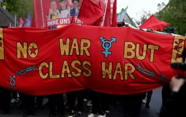 В Германия.