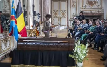 Жулиана Лумумба, която е дъщеря на Патрис Лумумба, изрази в Брюксел скръбта на семейството пред ковчега, в който бе положен само зъбът на конгоанския лидер.