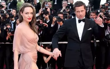 Джоли пратила папараци да я снимат „тайно“ с женения Брад Пит