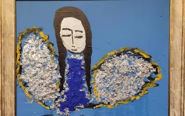 Един от наивистичните ангели на Росен Карамфилов.