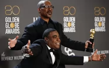 Еди Мърфи, носител на почетния приз "Сесил де Мил", и комикът Трейси Морган (долу).