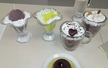 Това не са капучино и вкусни кремове - приличат много, но всъщност са свещи в стъклени чаши.  Дете може да се обърка и да поиска да си хапне. Сигналът е подаден от България. 