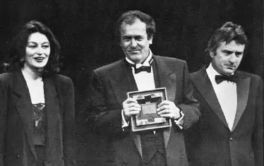  С Бертолучи и Робърт де Ниро в Кан през 1987 г.