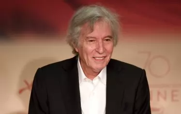 Другият задържан - режисьорът Жак Доайон.