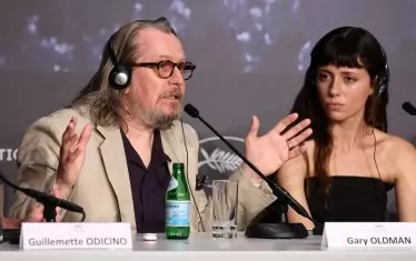  С Гари Олдман по време на пресконференция в Кан.