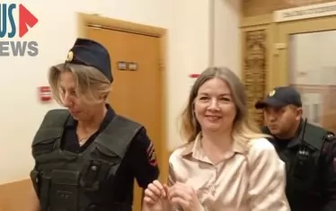 Руска журналистка бе осъдена на 12 г. 
заради връзка с фонда на Навални